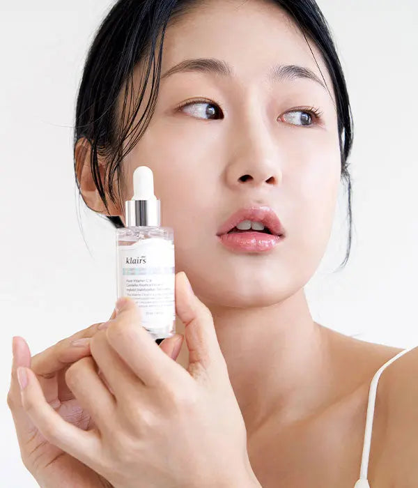 Klairs Freshly Juiced Vitamin Drop bottle with dropper - a staple in Korean skincare routines